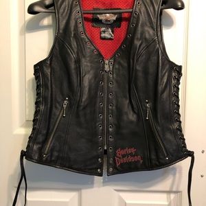 Harley Davidson women’s leather vest with laced sides.